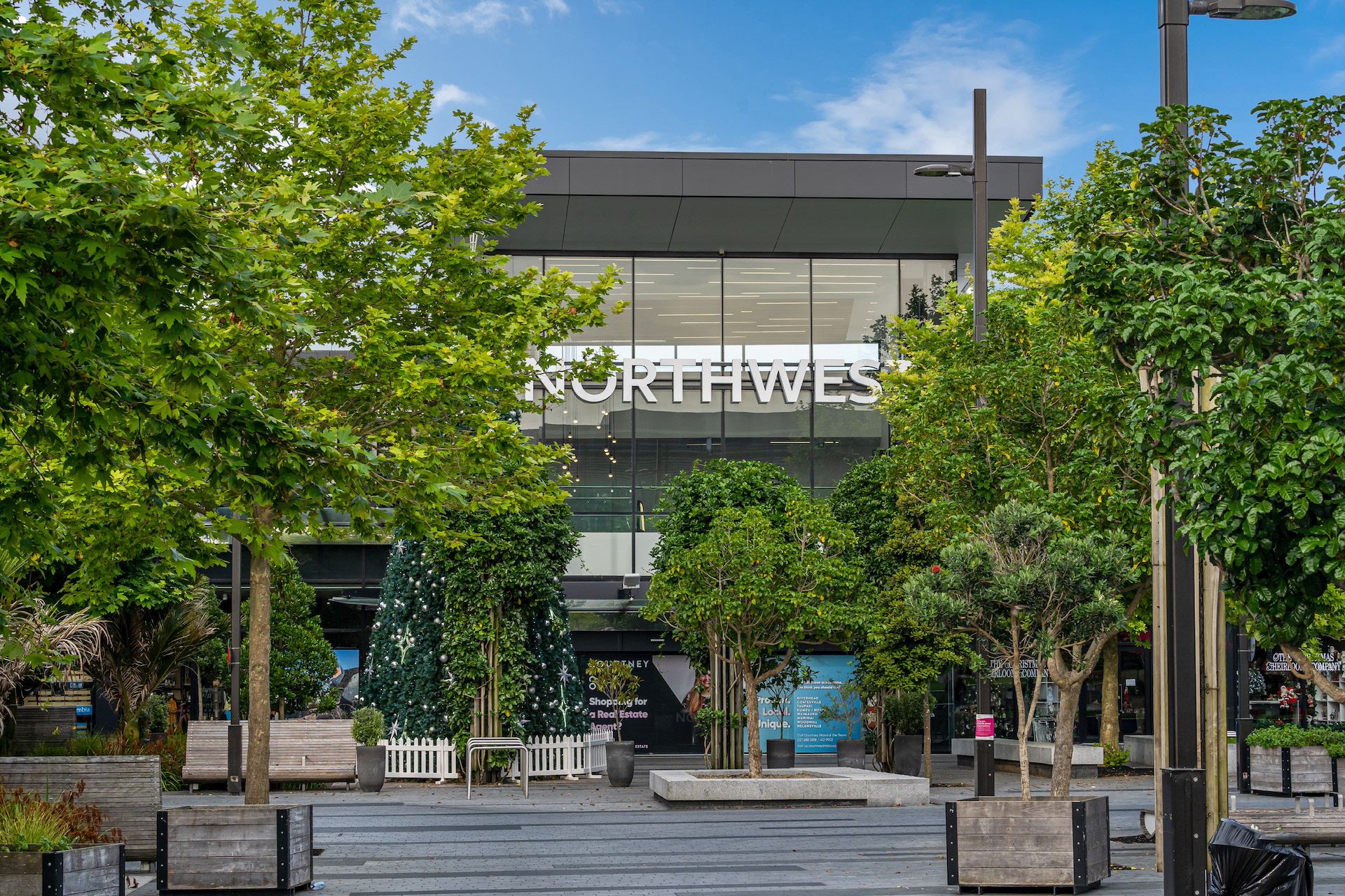 NorthWest Shopping Centre entrance framed by trees