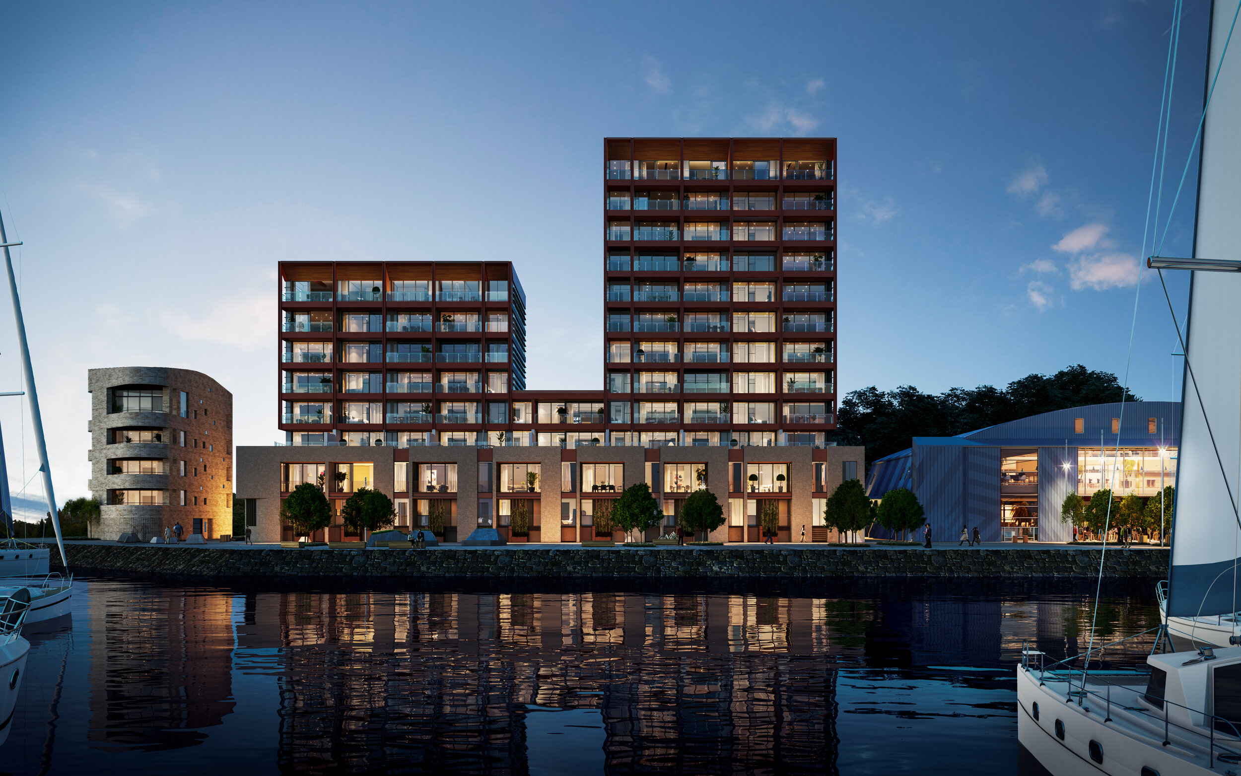 Launch Bay waterfront apartments at dusk